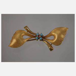 Schleifenbrosche mit Steinbesatz