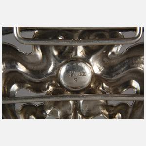 Evald Nielsen, Gürtelschließe