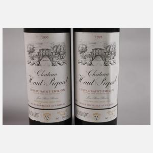 Vier Flaschen Rotwein