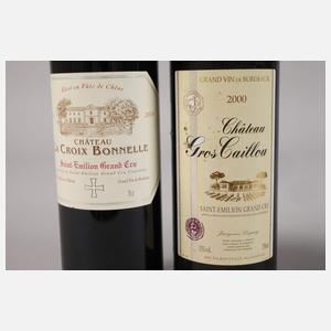 Vier Flaschen Rotwein