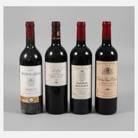 Vier Flaschen Rotwein111