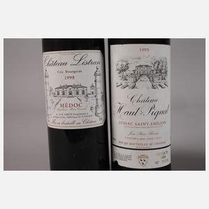 Vier Flaschen Rotwein