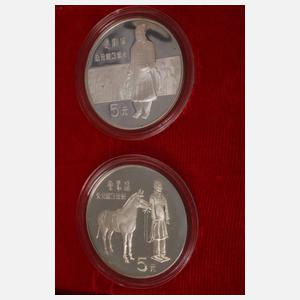 Vier Silbermünzen China