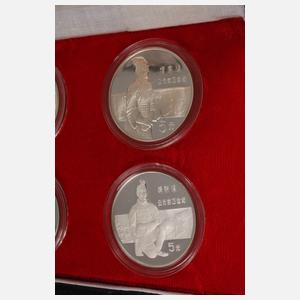 Vier Silbermünzen China