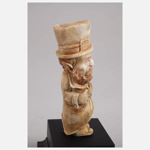 Figürliche Hornschnitzerei