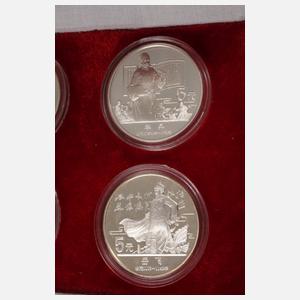 Vier Silbermünzen China