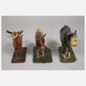 Drei Krippenfiguren als Kühe