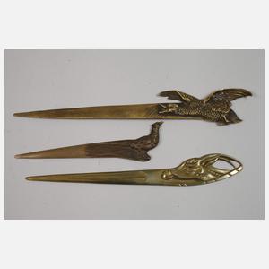 Sieben Brieföffner mit Tiermotiven