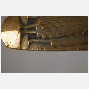 Acht figürliche Brieföffner