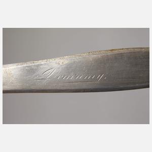 Acht figürliche Brieföffner