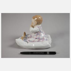Meissen "Kind, auf einem Kissen sitzend"