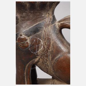 Holzfigur eines Tempellöwen