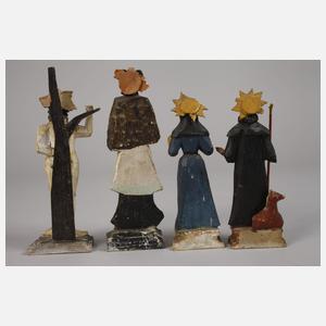 Vier geschnitzte Heiligenplastiken