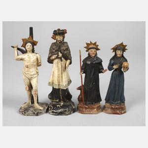 Vier geschnitzte Heiligenplastiken
