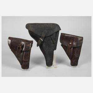 Drei Pistolentaschen