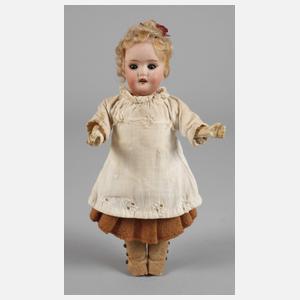 Kleine Porzellankopfpuppe