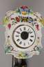 Kleine Porzellan-Schilderuhr