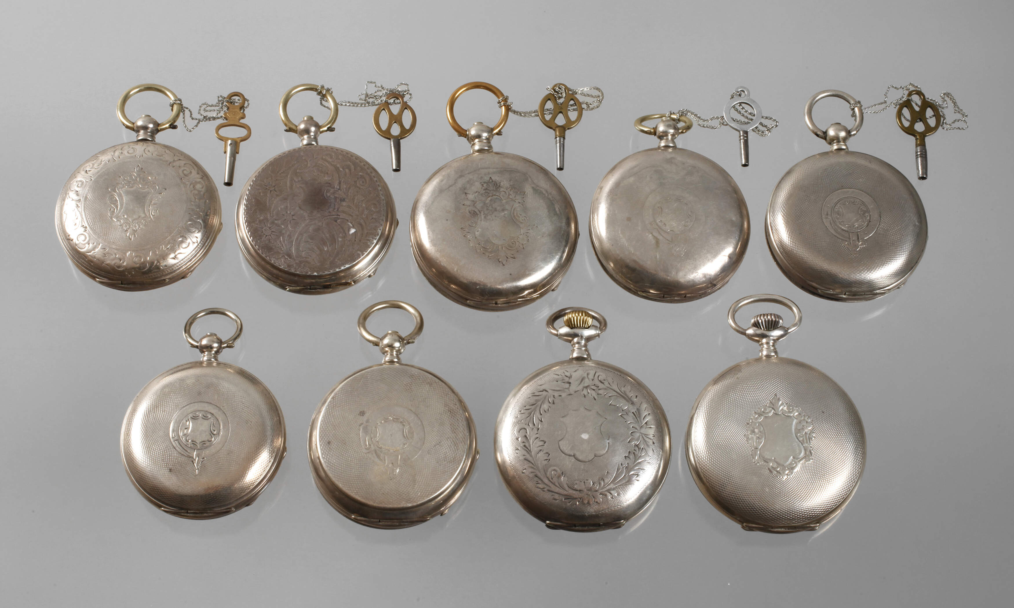 Neun Taschenuhren G. Jacot Locle