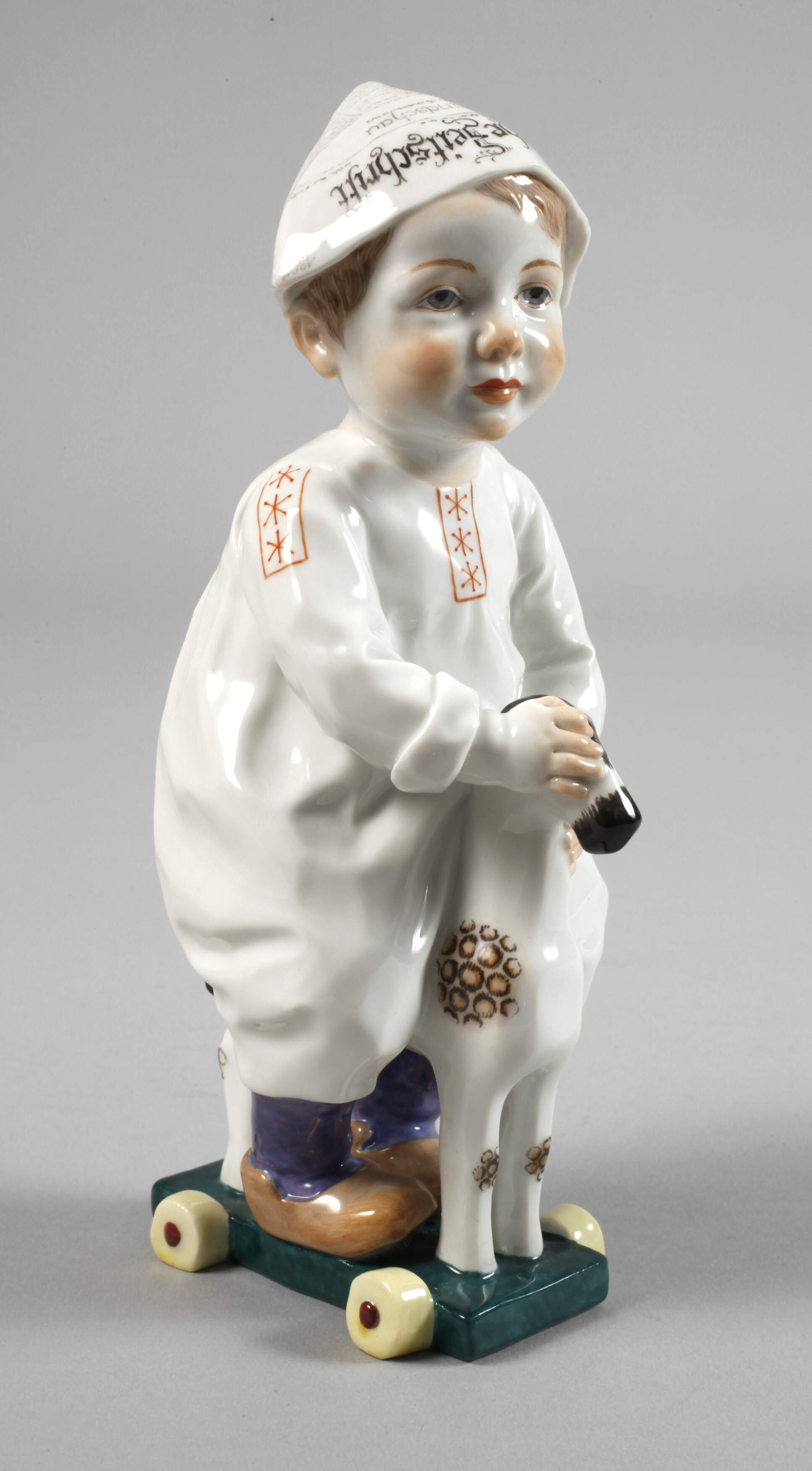 Meissen ”Kind, auf einem Holzpferd reitend”