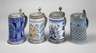 Vier Fayencewalzenkrüge