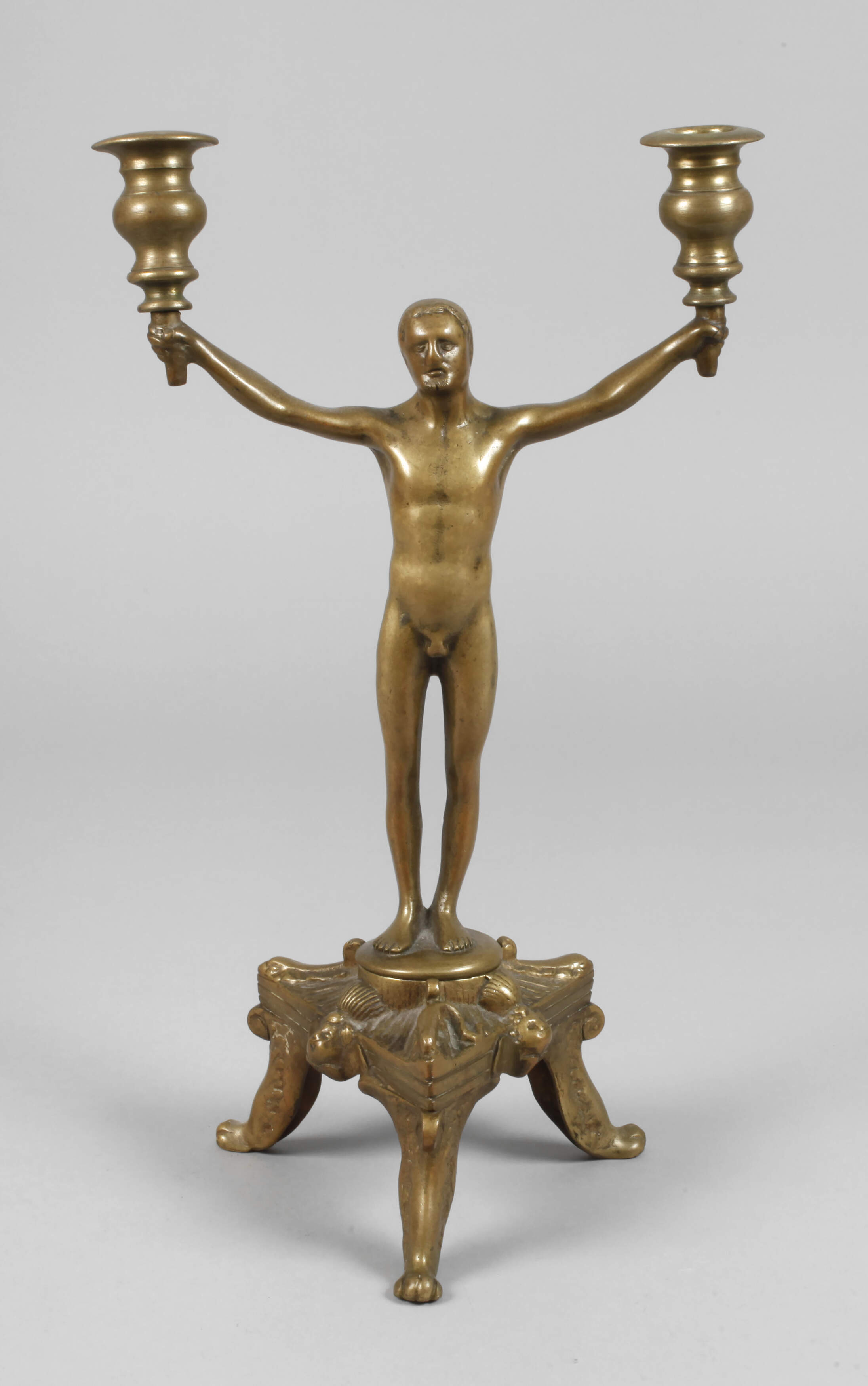 Figürlicher Messingleuchter