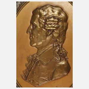 Paar große Eisengussreliefs