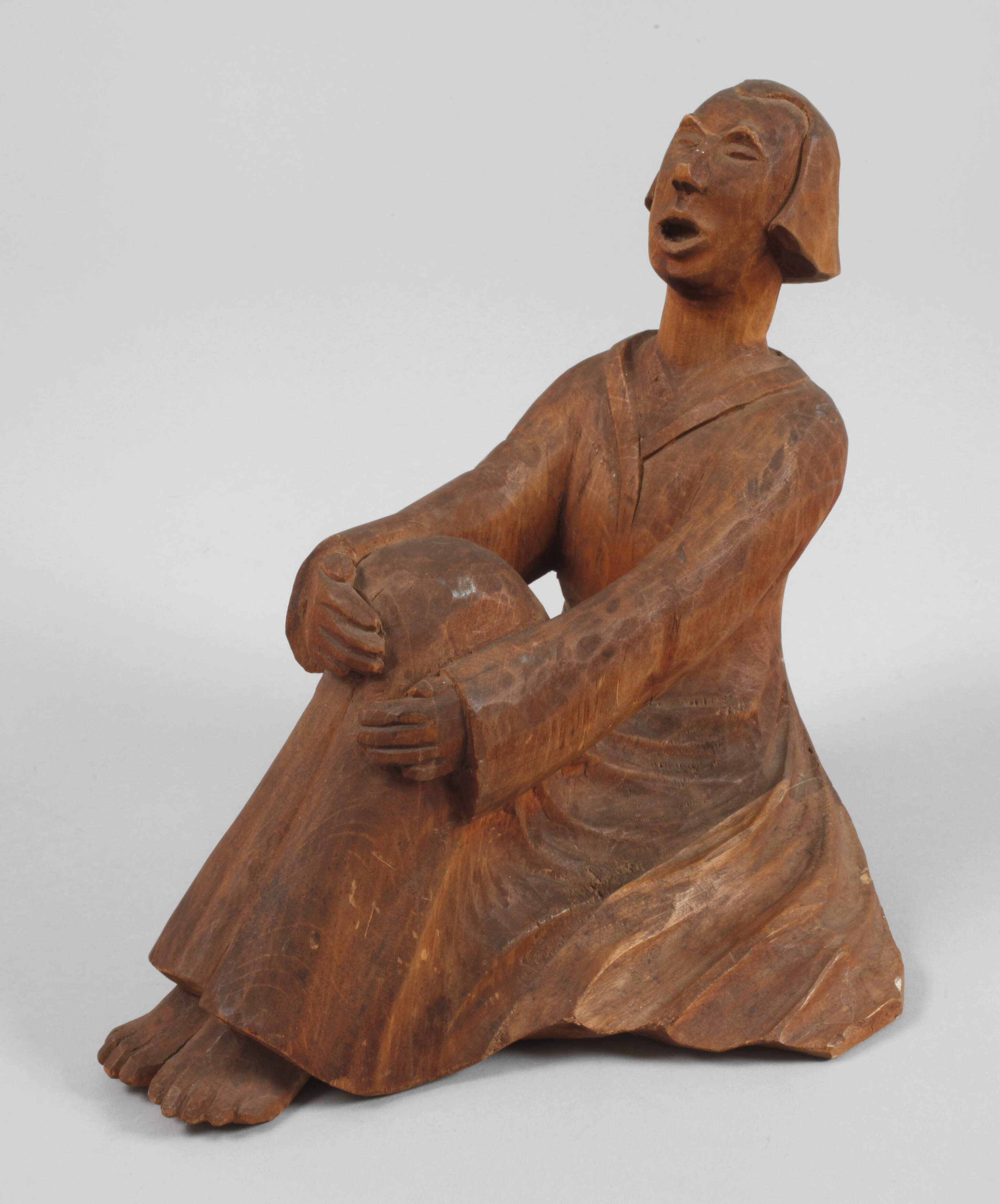Geschnitzte Holzfigur "Der Singende Mann"