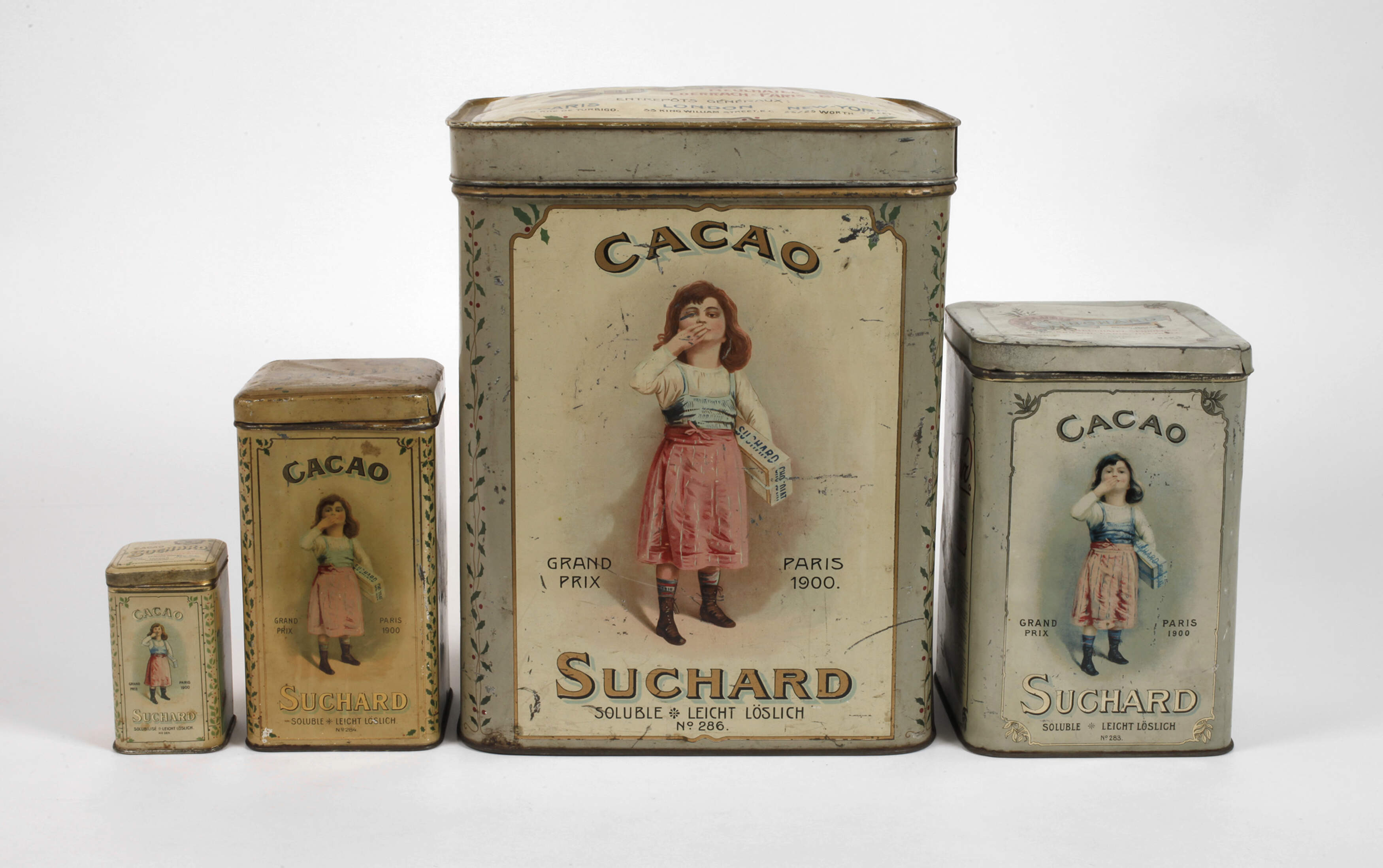 Vier Werbedosen Suchard