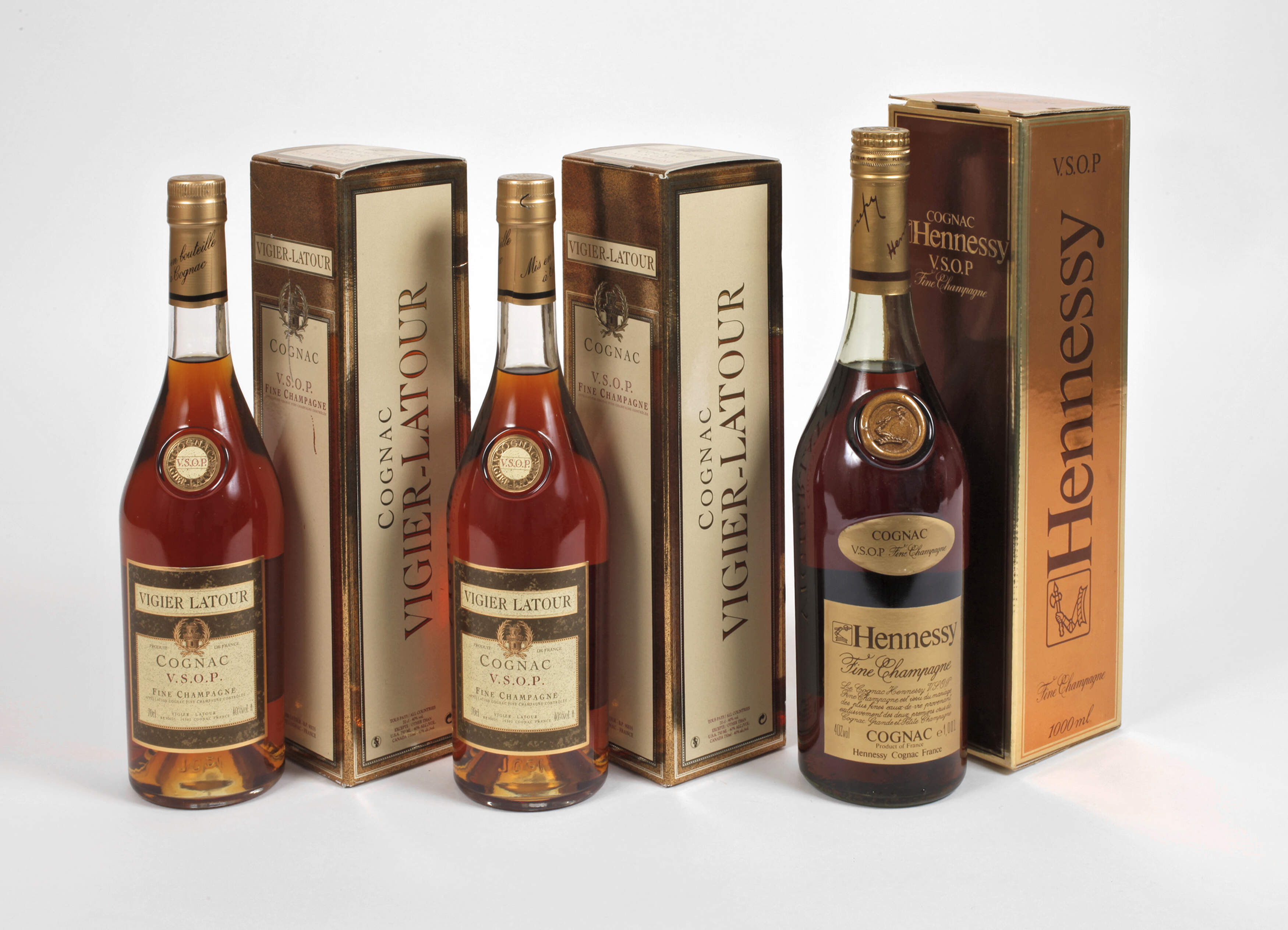 Drei Flaschen Cognac