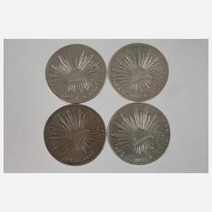 Acht Silbermünzen Mexiko