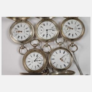 Neun Schlüsseluhren Silber