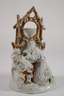 Figürlicher Uhrenständer Porzellan