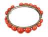 Ein Armreif mit Korallen