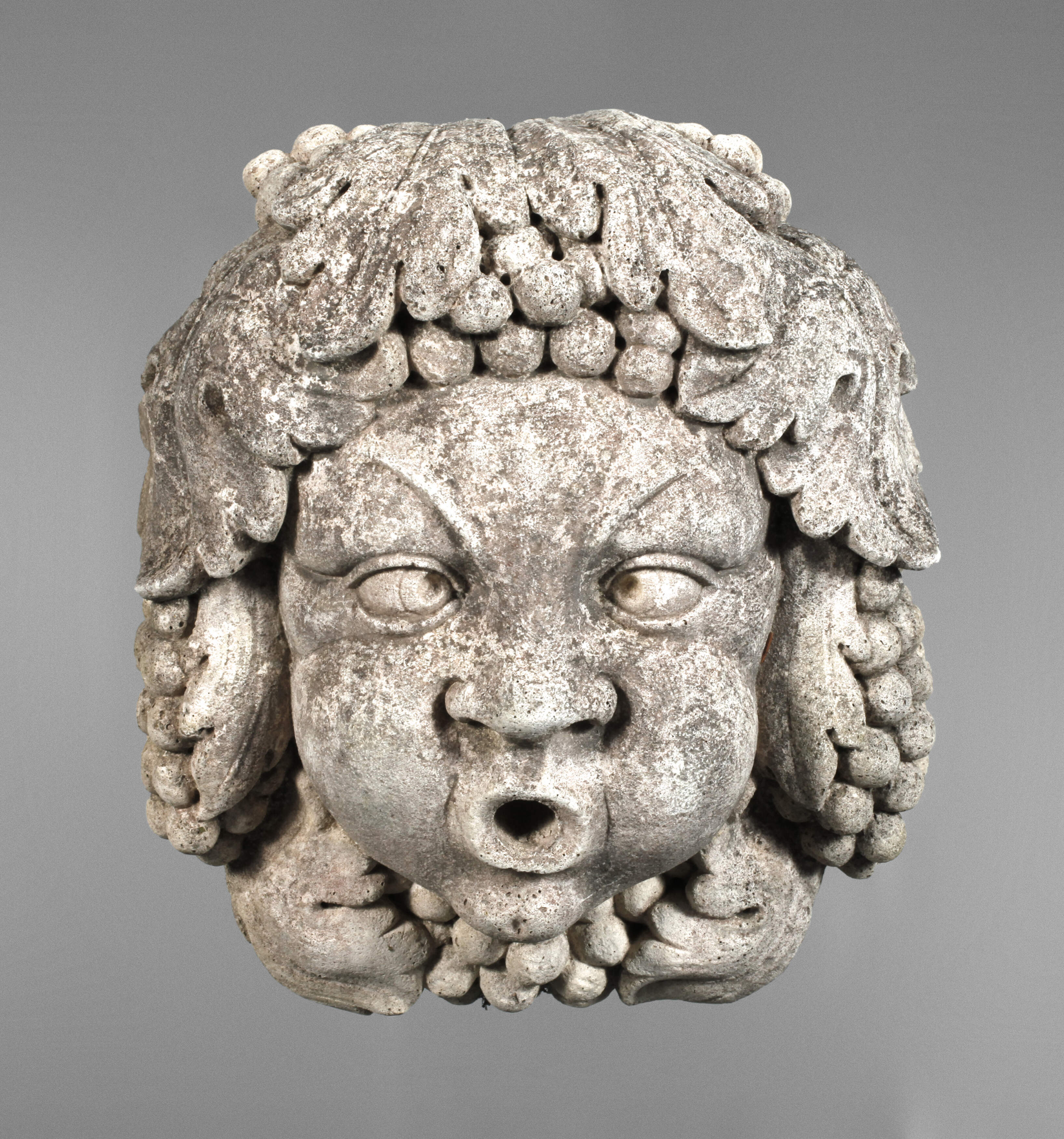 Wandmaske als Wasserspeier