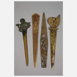 Sieben Brieföffner mit Tiermotiven