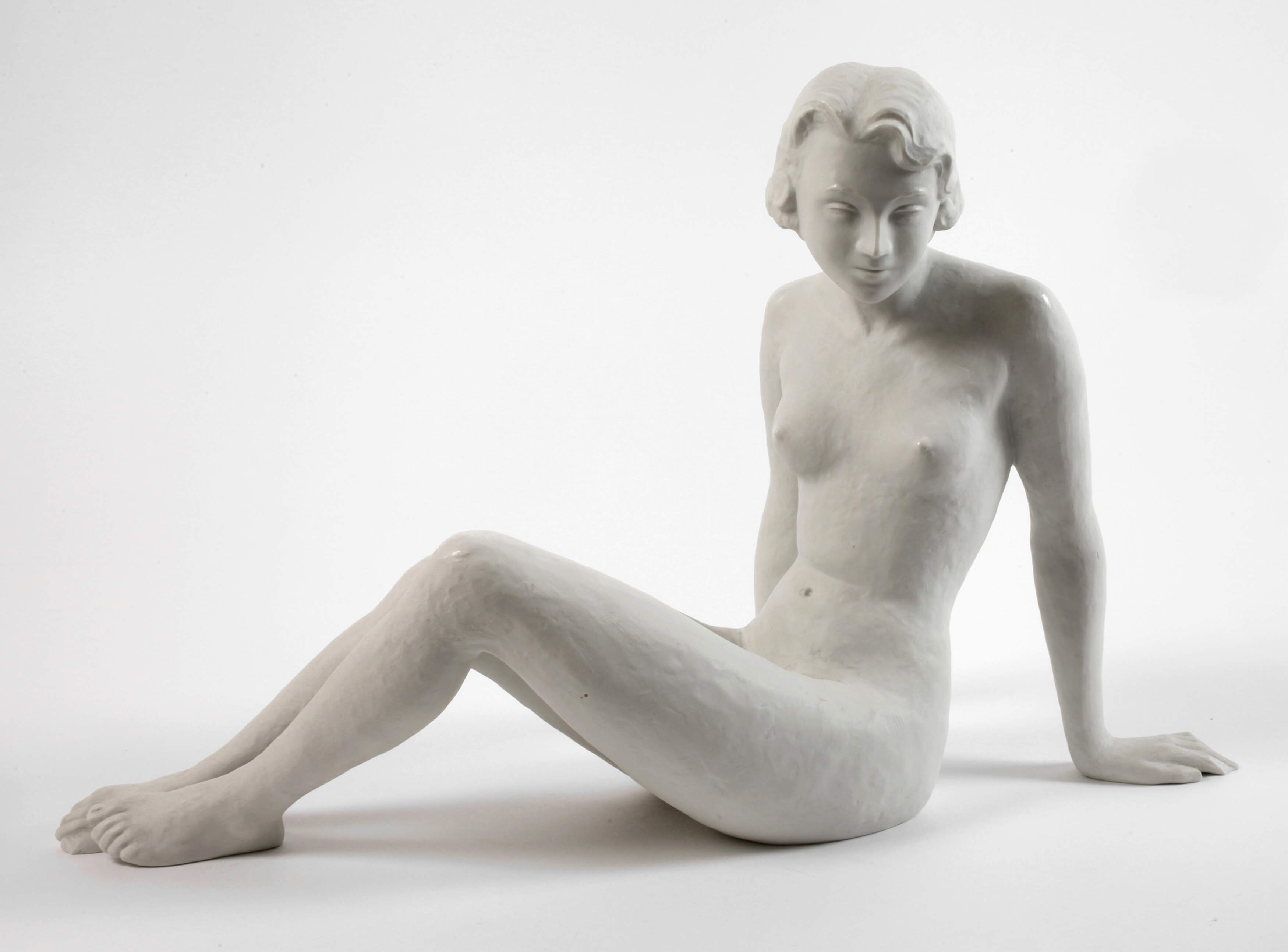 Rosenthal sitzender Mädchenakt