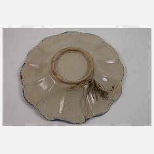 Vier Fayenceteller Blaumalerei