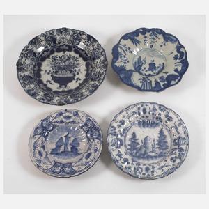 Vier Fayenceteller Blaumalerei