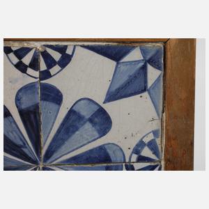 Vier Fliesen im Rahmen