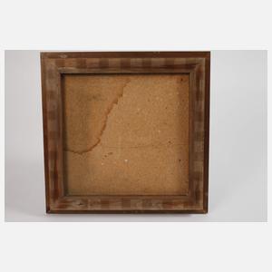 Vier Fliesen im Rahmen