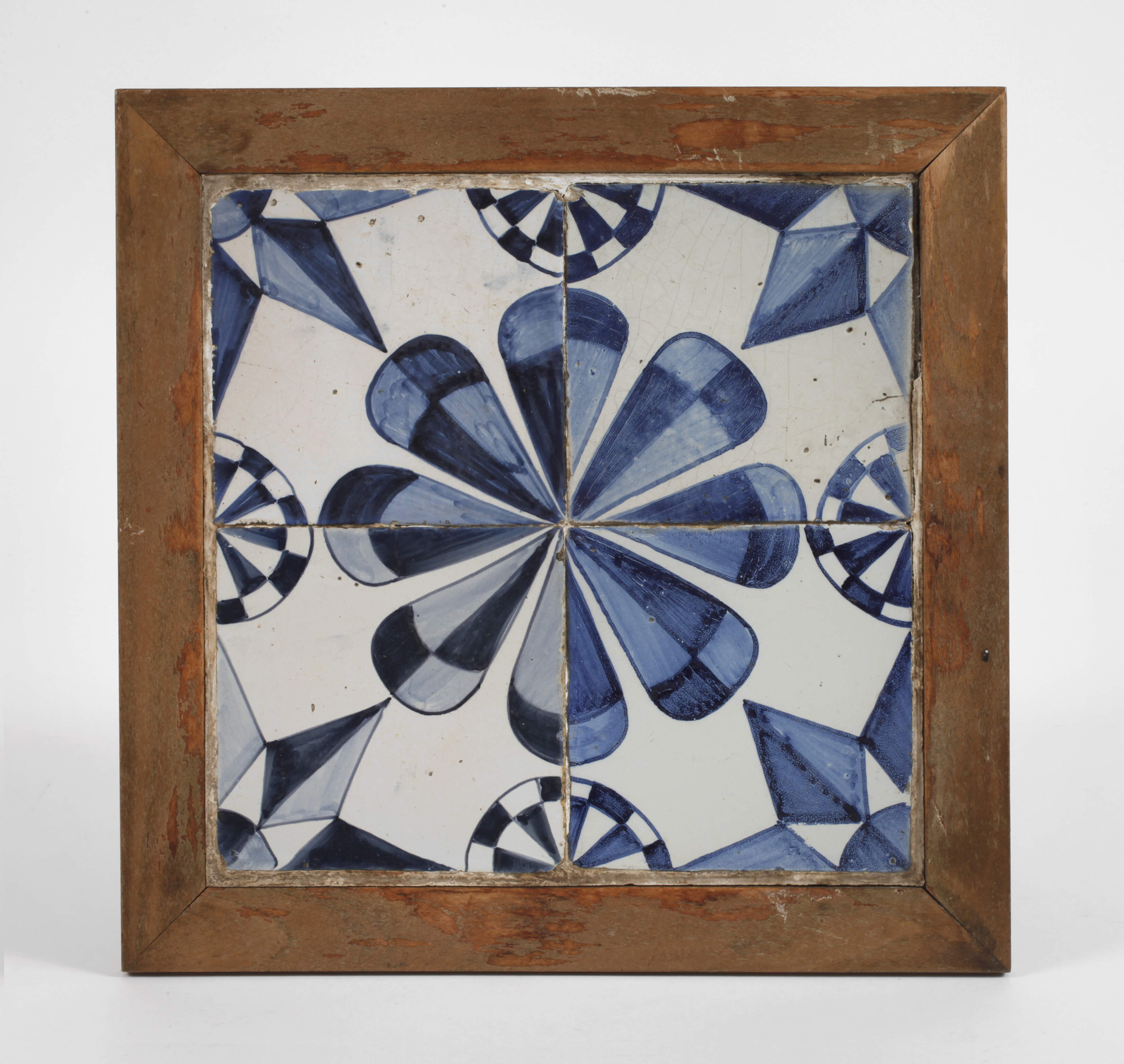 Vier Fliesen im Rahmen