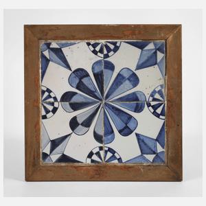 Vier Fliesen im Rahmen