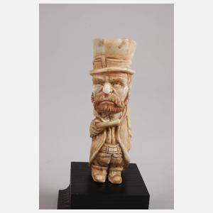 Figürliche Hornschnitzerei