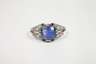 Damenring mit facettiertem Saphir