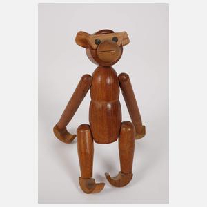 Holzspielzeug als Affenfamilie mit Schwein