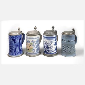 Vier Fayencewalzenkrüge