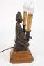 Figürliche Bronzelampe Art déco