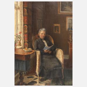 Buchleserin am Fenster