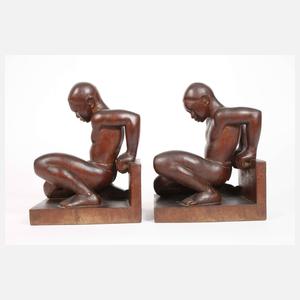Paar figürliche Buchstützen