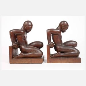 Paar figürliche Buchstützen